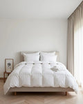 Woolups Neatly made bed with a Michell Mycroft Wool Duvet.